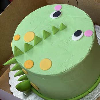 Rosie Bakery - Dinosaur cake. 6" vanilla sponge cake with 3 layers of sponge and 2 layers of vanilla cream with strawberry coulis and fresh strawberry. - Bakeries Near Me - Bellevue, Washington