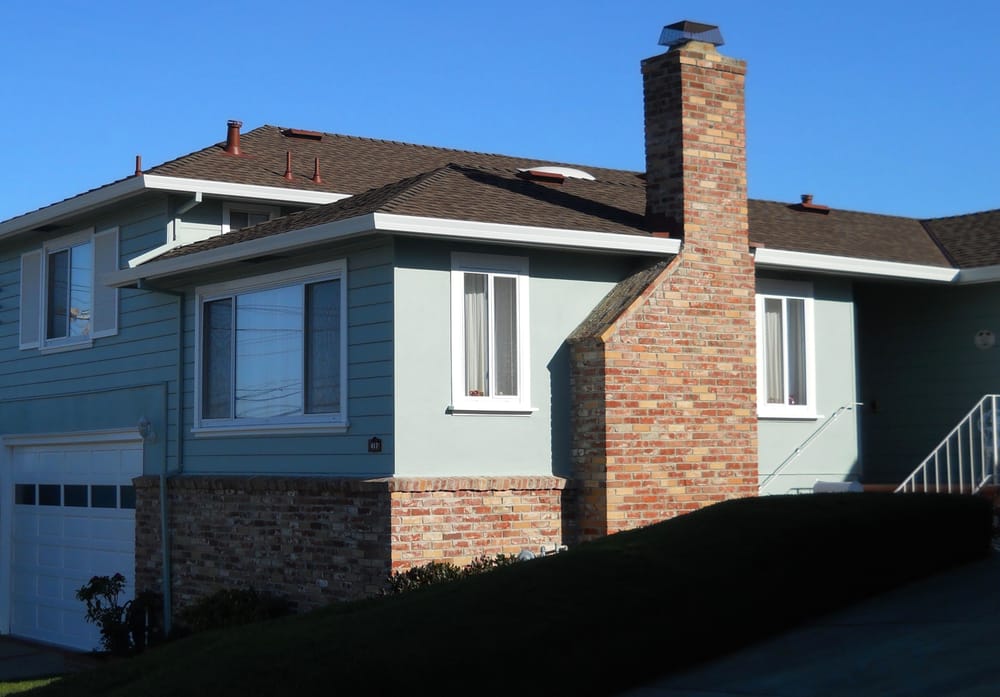 Slide of Signature Roofing