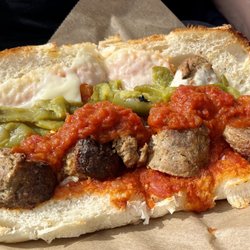 Giovanni's Brick Oven Pizzeria - Extra dog meatball for little Jeannie!