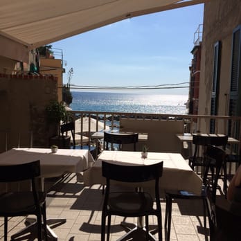 Rio Bistrot - Outdoor dining area looking down at the marina - Italian Near Me - Riomaggiore, SP