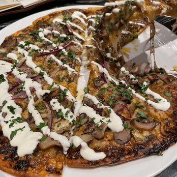 NoMI - Wild mushroom flatbread - Bars Near Me - Chicago, Illinois NoMI - Wild mushroom flatbread - Bars Near Me - Chicago, Illinois