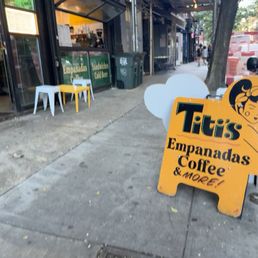 Exterior outside entrance of Titi’s - Exterior. entrance & signage - New York, New York Exterior outside entrance of Titi’s - Exterior. entrance & signage - New York, New York