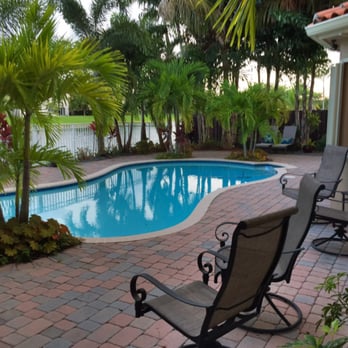 Anderson Landscaping - a pool and patio area - Landscaping Near Me - Homestead, Florida