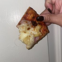 Found a hair embedded in the pizza under the cheese