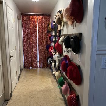 Aubrey Rose Tea Room - Hall to the restrooms with fancy hats - Tea Rooms Near Me - La Mesa, California