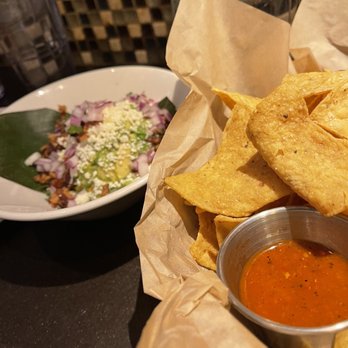 Xoco - Chips and Guacamole with bacon and Queso Fresco - Mexican Near Me - Chicago, Illinois Xoco - Chips and Guacamole with bacon and Queso Fresco - Mexican Near Me - Chicago, Illinois