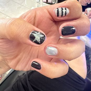 Lecheta Nail Bar - Tracy did a black and blue ( cat eye ) nails with stripes and a star! - Nail Salons Near Me - Bellflower, California Lecheta Nail Bar - Tracy did a black and blue ( cat eye ) nails with stripes and a star! - Nail Salons Near Me - Bellflower, California