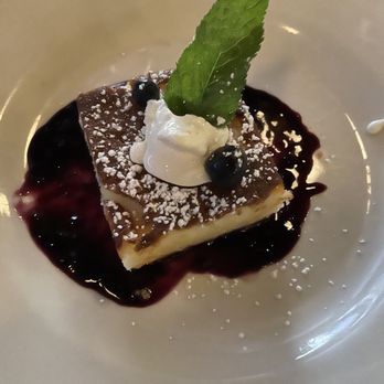 Blueprint on 3rd - Ooey gooey butter cake with blueberry sauce - American Near Me - Birmingham, Alabama Blueprint on 3rd - Ooey gooey butter cake with blueberry sauce - American Near Me - Birmingham, Alabama