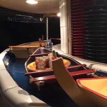 Katana - sushi floating along. - Sushi Bars Near Me - Miami Beach, Florida