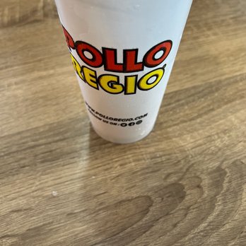 Pollo Regio - a plastic cup on a wooden table - Chicken Shop Near Me - Fort Worth, Texas