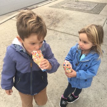 Dairy Queen Store - Grandkids eating a cone with sprinkles - Ice Cream & Frozen Yogurt Near Me - Keego Harbor, Michigan Dairy Queen Store - Grandkids eating a cone with sprinkles - Ice Cream & Frozen Yogurt Near Me - Keego Harbor, Michigan