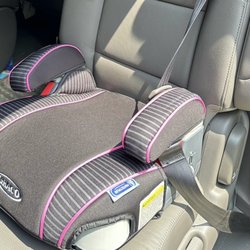 Garland Home Center - Great new booster seat has retractable cup holders built in.