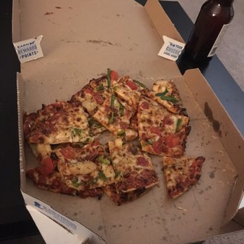 Domino's Pizza - a pizza in a box and a bottle of beer - Chicken Wings Near Me - Sterling Heights, Michigan
