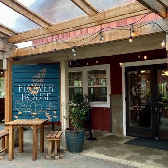 Flower House Cafe - Outside there is a covered area with tables - New American Near Me - Langley, Washington