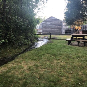 The Polka Dot - Creek near seating area.  Nice made it enjoyable minus the bugs flying around - American Near Me - Quincy, California