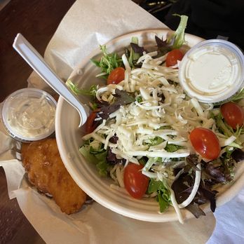 The First Seat - Fish and side salad - Sports Bars Near Me - Bentonville, Arkansas The First Seat - Fish and side salad - Sports Bars Near Me - Bentonville, Arkansas