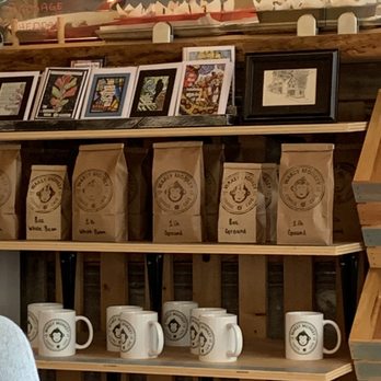 Wakey Monkey - Saluda - a shelf of coffee bags and mugs - Coffee & Tea Near Me - Saluda, North Carolina Wakey Monkey - Saluda - a shelf of coffee bags and mugs - Coffee & Tea Near Me - Saluda, North Carolina