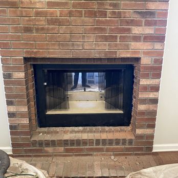 Red River Chimney and Fireplace - Not centered, not sealed. All the brickwork on right side left broken. - Fireplace Services Near Me - Clarksville, Tennessee
