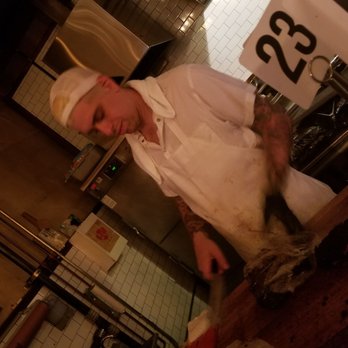 Hometown Bar-B-Que - Chef slicing and weighing our order - Barbeque Near Me - Brooklyn, New York