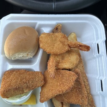 Banda's Seafood - 2 shrimp and 2 fish with 3 potato wedges, roll and tartar sauce - Seafood Near Me - Corpus Christi, Texas Banda's Seafood - 2 shrimp and 2 fish with 3 potato wedges, roll and tartar sauce - Seafood Near Me - Corpus Christi, Texas