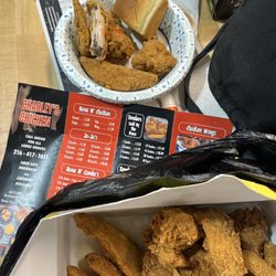 Sunoco Charley Biggs Fried Chicken - Chicken, Joe Joe's, and sweet Hawaiian roll with a side of hot sauce.