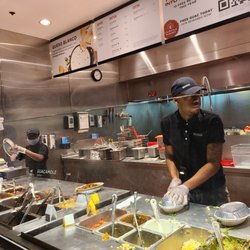Chipotle Mexican Grill - Can't see the grill here, but look at all of the pans and utensils already stacked up.