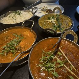 Lamb curry, chicken tikka masala, saag paneer and rice