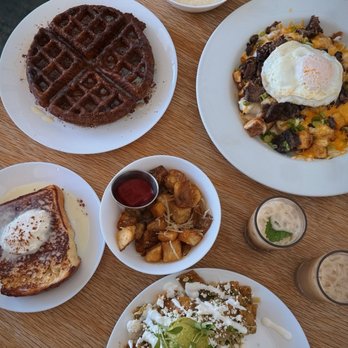 The Nest: A Brunch Joint - Green Chilaquiles Verde, Breakfast Poutine, Churro Waffle, mini French toast, Grits, potatoes - Breakfast & Brunch Near Me - Bellflower, California The Nest: A Brunch Joint - Green Chilaquiles Verde, Breakfast Poutine, Churro Waffle, mini French toast, Grits, potatoes - Breakfast & Brunch Near Me - Bellflower, California