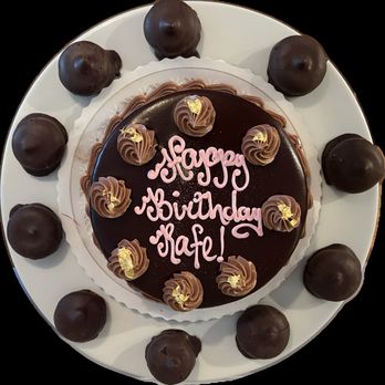 Scandia Bakery - flourless chocolate cake surrounded by the famous mocha macaroons - Bakeries Near Me - Sonoma, California