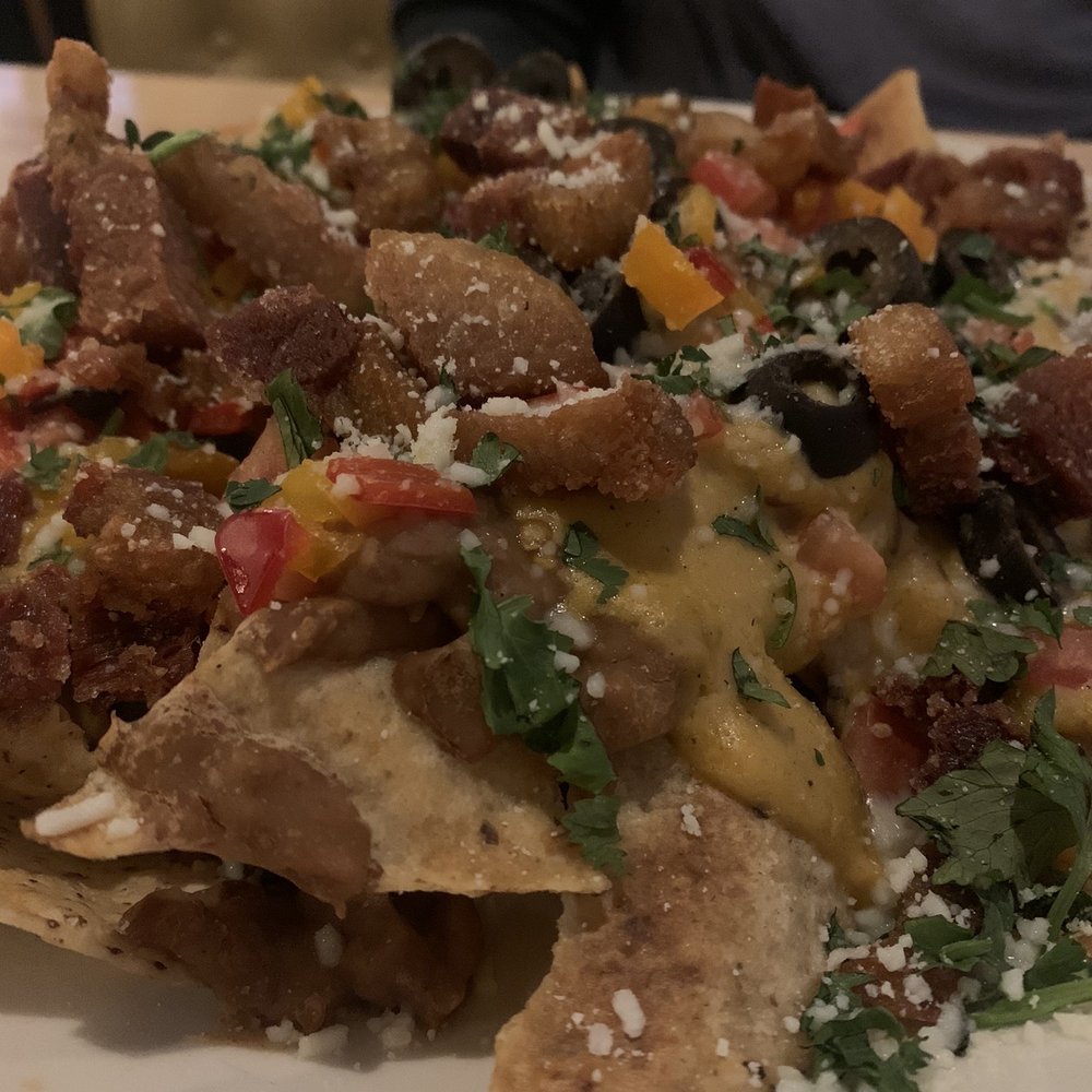 The Den - Fried Pork Belly Nacho. - Seafood Near Me - Houghton, Michigan The Den - Fried Pork Belly Nacho. - Seafood Near Me - Houghton, Michigan
