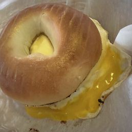 Egg and cheese on a bagel. Egg and cheese on a bagel.