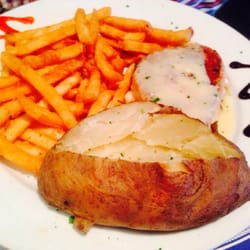 Pensacola Yacht Club - Grilled Tuna, baked potato and French fries.