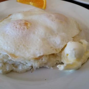 Sam's Log Cabin - Grits with over easy eggs on top... and dat buttah. - Breakfast & Brunch Near Me - Albany, California Sam's Log Cabin - Grits with over easy eggs on top... and dat buttah. - Breakfast & Brunch Near Me - Albany, California