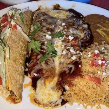 Pappasito's Cantina - 1 Beef, 1 Chicken enchilada with giant like 10" beef taco, that thing is bigger in person, this whole plate is actually huge. - Tex-Mex Near Me - Austin, Texas