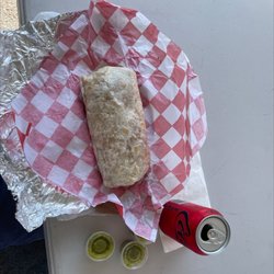 La Tapatia Mexican Grill - Bacon breakfast burrito with green salsa! $10.49 looks good