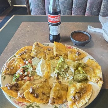 El Tapatio Mexican Restaurant - Steak nachos with a Mexican coke along - Mexican Near Me - Broomfield, Colorado El Tapatio Mexican Restaurant - Steak nachos with a Mexican coke along - Mexican Near Me - Broomfield, Colorado