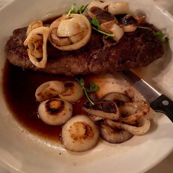 Log Cabin Steakhouse - 16 oz. Chopped steak with grilled onions and au jus. - Seafood Near Me - Galena, Illinois Log Cabin Steakhouse - 16 oz. Chopped steak with grilled onions and au jus. - Seafood Near Me - Galena, Illinois