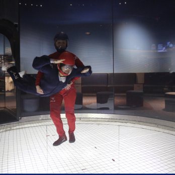 iFLY Indoor Skydiving - Paramus - In the tunnel with the instructor - Skydiving Near Me - Paramus, New Jersey