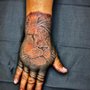 Photo of Art In The Skin Tattoo Shop