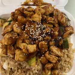 Tokyo Japan - Sesame chicken, comes with fried rice zucchini and onions