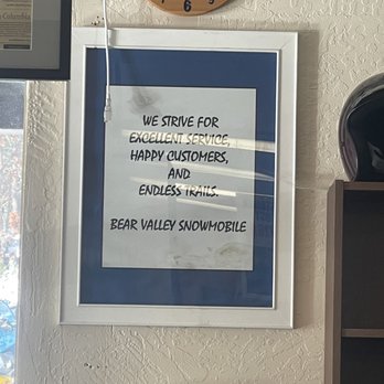 Bear Valley Snowmobile - The sign stating they strive for excellent service and happy customers. - Ski & Snowboard Shops Near Me - Bear Valley, California Bear Valley Snowmobile - The sign stating they strive for excellent service and happy customers. - Ski & Snowboard Shops Near Me - Bear Valley, California