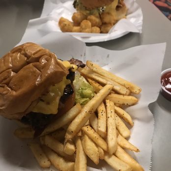 Lebowski's Grill - Bacon burger for me & Frito Pie burger for my friend - Burgers Near Me - Austin, Texas Lebowski's Grill - Bacon burger for me & Frito Pie burger for my friend - Burgers Near Me - Austin, Texas
