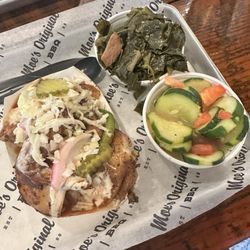 Chicken plate, cucumber and tomato salad and collard greens Delicious!