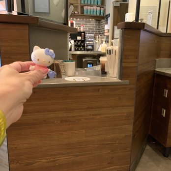 Starbucks - a person holding a hello kitty toy - Coffee & Tea Near Me - West Hills, California Starbucks - a person holding a hello kitty toy - Coffee & Tea Near Me - West Hills, California