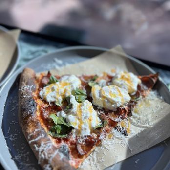 Miami Slice - a slice of pizza on a plate - Pizza Near Me - Miami, Florida