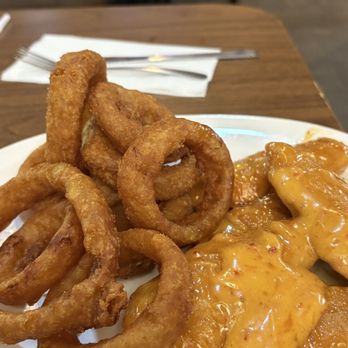 The LaFayette Inn - Bang bang chicken tenders and onion rings. - Seafood Near Me - LaFayette, New York The LaFayette Inn - Bang bang chicken tenders and onion rings. - Seafood Near Me - LaFayette, New York