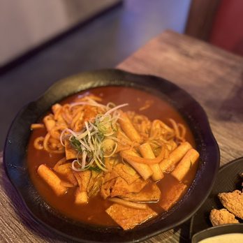 Mighty Chick - a bowl of soup and a plate of crackers - Chicken Wings Near Me - Plano, Texas