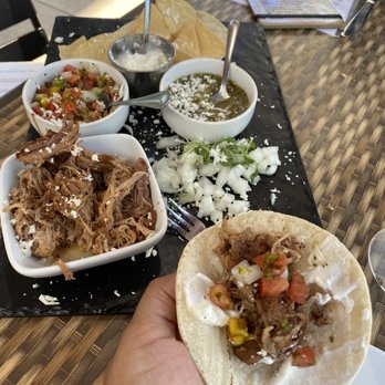 4 Sisters Wine Bar and Tapas - Taco tapas about four mini corn tortilla chips and sides to make mini tacos - Wine Bars Near Me - La Crosse, Wisconsin 4 Sisters Wine Bar and Tapas - Taco tapas about four mini corn tortilla chips and sides to make mini tacos - Wine Bars Near Me - La Crosse, Wisconsin