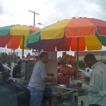 Dog Gone It - a man selling food under umbrellas - Hot Dogs Near Me - Los Angeles, California Dog Gone It - a man selling food under umbrellas - Hot Dogs Near Me - Los Angeles, California