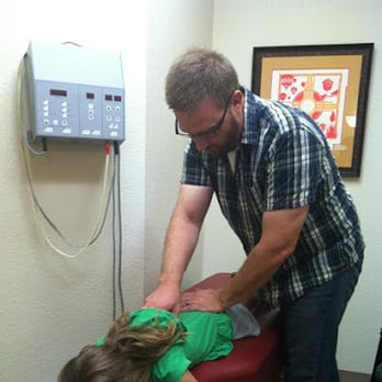 Helping Hands Chiropratic - Dr. Williams treating a younger patient - Chiropractors Near Me - Las Cruces, New Mexico Helping Hands Chiropratic - Dr. Williams treating a younger patient - Chiropractors Near Me - Las Cruces, New Mexico